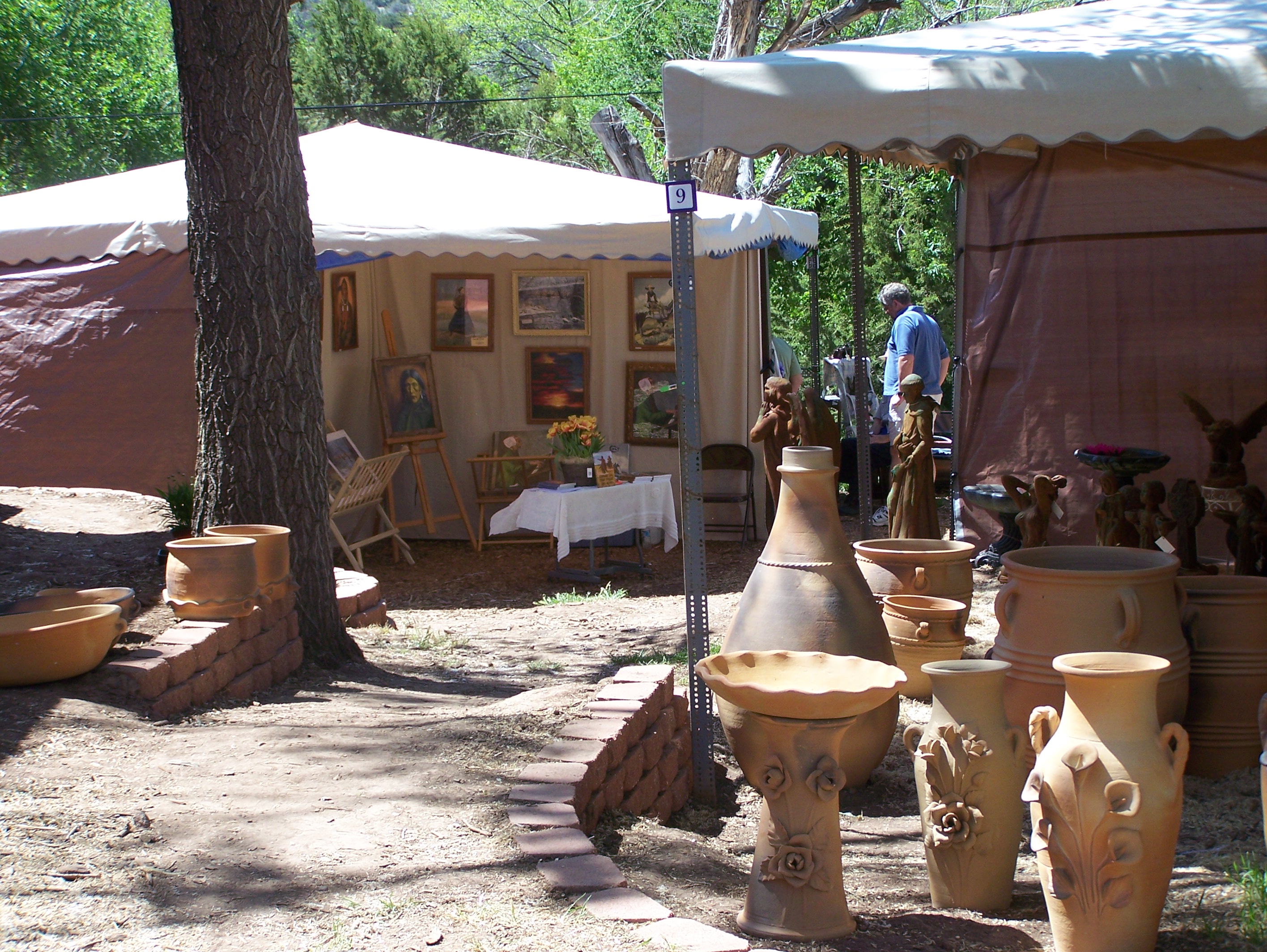 https://tijerasartsmarket.com/jig/img/uploads/Booths%20w%20Pots1.jpg